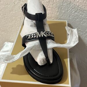 Michael Kors Black Leather T-Strap Sandals with Silver MK Chain Accent